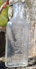 Vintage Antique Clear Embossed Booker Medicine Bottle Short Small 3 3 4  Tall