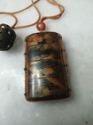 An Edo Period Japanese Samurai Inro With Bead And Bronze Netsuke
