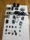 Huge Lot Of 31  Camera  camera Batrries  Lense nikon olympus Tamron