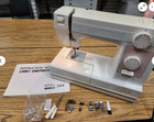 New Janome Model 344 Mechanical Sewing Machine - Portable  New In Box