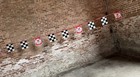 Vintage 20    Valvoline Banner Checkered Flags String Of Pennants Older Logo Sign