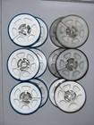  12  8mm Film Reels In Their Cases