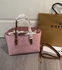 Coach Outlet Mollie Tote Bag 25 Signature Canvas Charms Gold Powder Pink Cer24