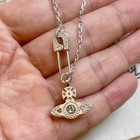 Vivienne Westwood Silver Orb Safety Pin Lucrece Pendant Necklace Platinum White