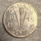 1945 Canadian 5-cent Piece  Commonly Known As A  victory Nickel 