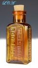 Antique Indian Root Pills Bottle Blown Glass W label W H Comstock Miniature