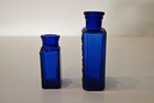 A Pair Of Tinct Iodine Bottles With Skull And Crossbones