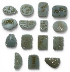A Group Of 15 Chinese White Jade Carvings
