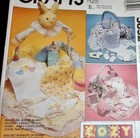 Mccall s Pattern 5852 751 Baby s Bib Bonnet Blanket Bunny Basket Soft Toy Uncut