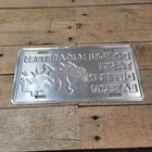 Vintage Do Your Cigarettes Taste Different Lately Tobacco Metal Sign