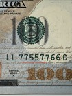 2009a  100 Federal Reserve Note - Fancy Serial Number 77557766 - Alignment Error