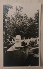 A Happy Baby In A Buggy Or Pram Ouside Surrounded By Trees  Antique 1910s Photo
