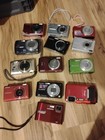 As Is Lot Of 13- Canon Coolpix Nikon Kodak Samsung Cameras For Parts Or Repair