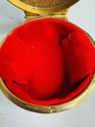 Vintage Gold Tone Etched Round Jewelry Box W  Red Velvet Lining   Marked Base
