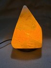 Hand Carved Pyramid Shaped Himalayan Salt Lamp With A Wooden Base