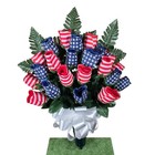 Cemetery Vase With Grave Flowers Including Red  White  And Blue Rosebuds 
