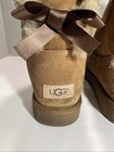 Ugg Women s Bailey Suede With Silk Bow Bootie In Chestnut Size 9