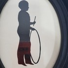 Vintage Oval Silhouette Framed Art Boy Holding Hoop And Stick Black Frame