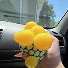 Mesh Squeeze Stress Splat Ball Toy With Net  Green Yellow Black