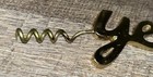 Brass Corkscrew With The Word Yes Spelled Out 