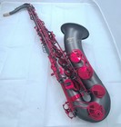 The Imperium Pro Matte Black Sa80-ii Tenor Saxophone With Red Lacquered Keys