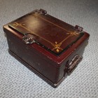Antique Iron Strong Box With Decorative Cast Iron Handles And Stenciled Designs