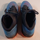 Under Armour Curry 2 5  Featuring A Blue And Black Design With Orange Accents