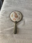 Victorian Vanity Mirror     Porcelain Putti  Brass Handle  Cupid Motif  5  Wide