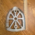 Antique Cast Iron Sad Iron Trivet Cathedral Spoke Design Footed Silver Rust 6in