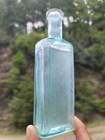 1890 s Aqua Sucken Panels Medicine Bottle    Beautiful Antique Cure Bottle 