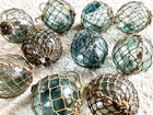 10 Japanese Antique Glass Fishing Floats W  Nets     Used     Approx  3 15  Dia