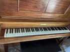 A 1926 Bellmann Upright Player Piano That Has Been Converted To Electric