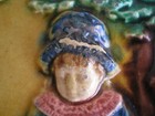 Victorian Relief Molded Majolica Tile Depicting Child Reading On Log