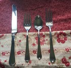  lotus  4 Piece Sterling Place Setting By Wallace