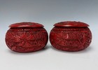 A Pair Of Chinese Cinnabar Lacquer Boxes With Carved Landscape Scenes