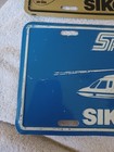 2 Vintage Blackhawk Sikorsky Spirit Advertising License Plate Embossed