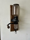 Arcade Crystal No  3 Wall Mount Cast Iron Coffee Grinder  mill On Wooden Board