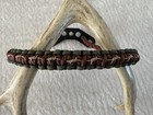 Brown od Green And Tan Bow Wrist Sling