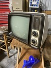 General Electric Vintage Portable Television With Dials And Antenna