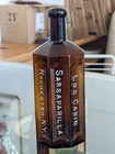    awesome    Amber Warner s Safe Log Cabin Sarsaparilla Bitters Bottle
