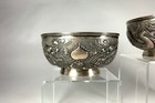 A Fine Antique Pair Of Signed Chinese Silver Dragon Bowls