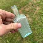 Antique Aqua Blown Glass Medicine Bottle  Bow-tie Base  Pontil Mark  1850s-1870s