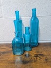 Vtg Apothecary Bermuda Blue Glass Decorative Bottles Mcm Set Of 4 Aqua Oil Jars