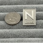 Novell Defunct Software Company Silver Tone Employee Pin Pinback  59846