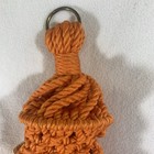 Vintage 1970   s Macrame Orange Plant Holder With Ceramic Bird