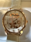 Tommy Bahama Women s Quartz Watch Gold Tone Floral Dial White Leather Strap