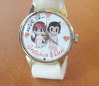Vintage Love Is    Kim Casali Watch Gretchen And Dave Figures White Cloth Band