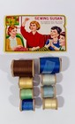 Vintage Sewing Susan Needle Card With Needles Plus Wooden Thread Spools