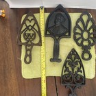 Lot Of 4 Vintage Cast Iron Footed Sad Iron Trivet   s