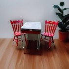 Vintage Table With 2 Red Chairs From The 1950   s Era